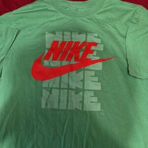 Nike Mint Green Tee with Bold Red Swoosh